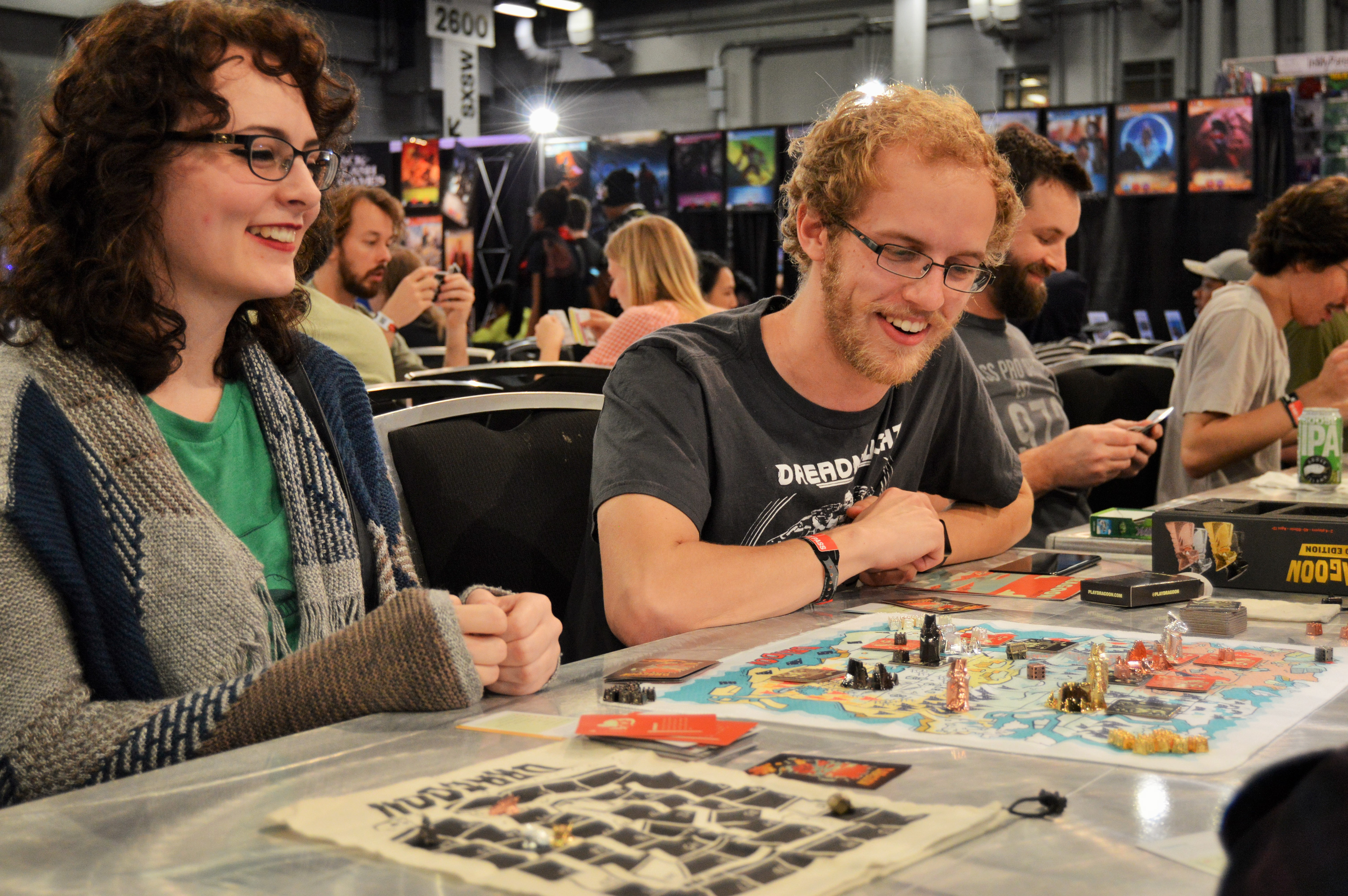 Sxsw Gaming Expo Attendees Having Fun At The Tabletop Experience