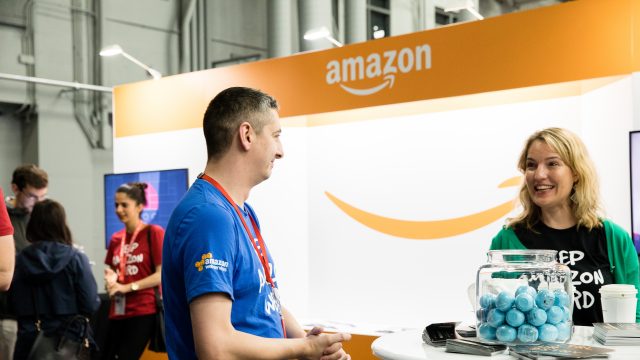 A SXSW attendee talks to an employer at the SXSW Job Market 2017.