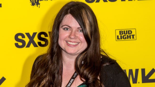 Lindsey Dryden on the step and repeat for the screening of Unrest - Photo by Cal Holman