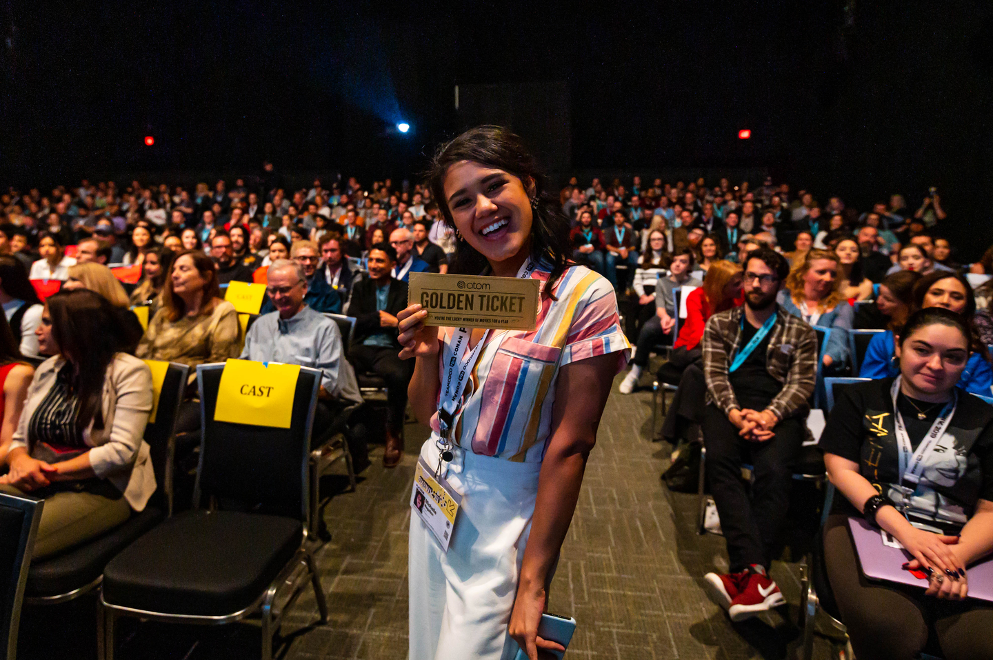 Golden Ticket Giveaway in the audience at the Red 11 premiere at Atom Theater.