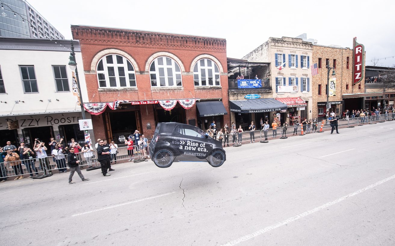 Daimler's smart EQ fortwo drone car performance happens at 3pm on Sixth Street through March 12. Photo by Adam Kissick