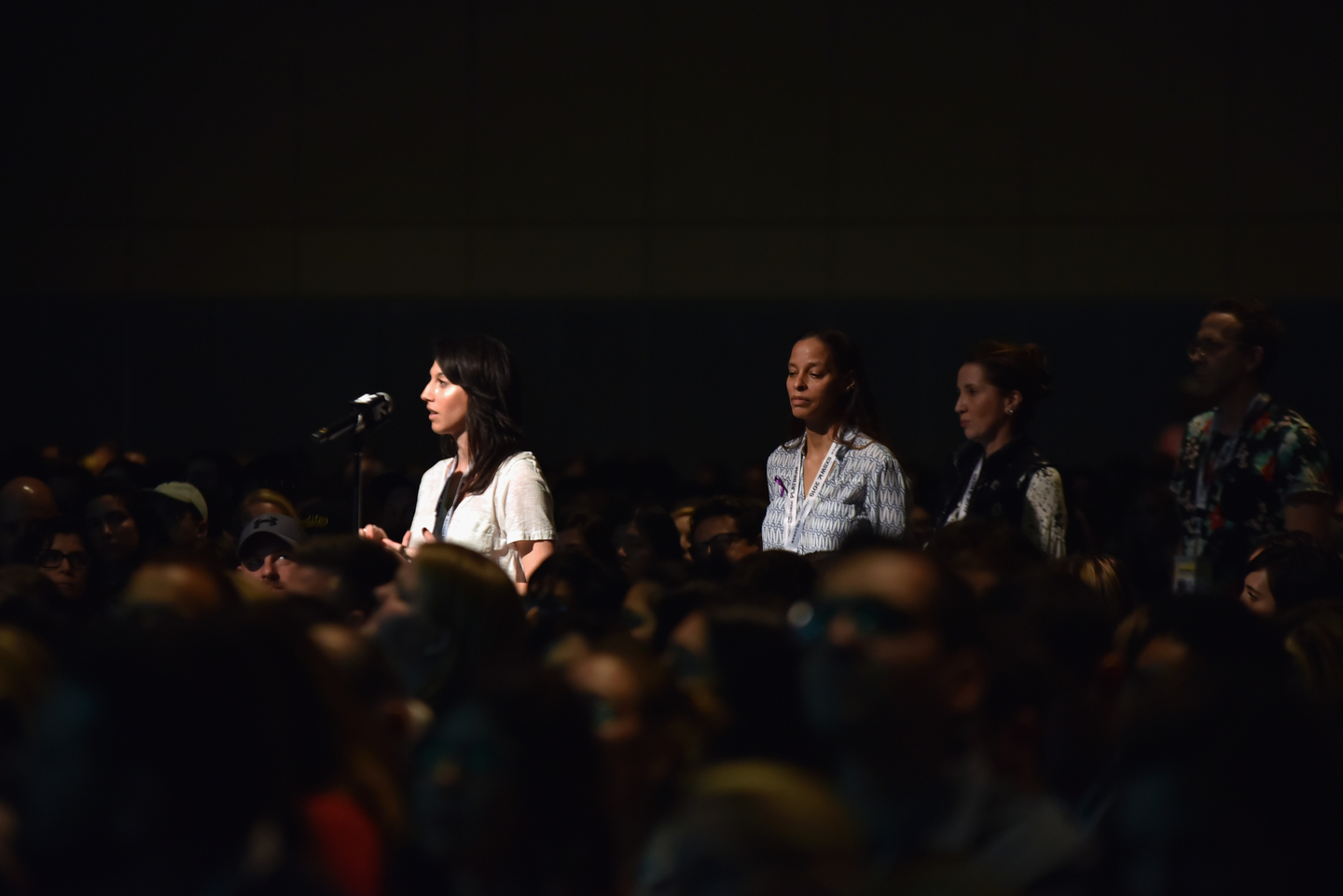 Audience members line up to ask her questions.