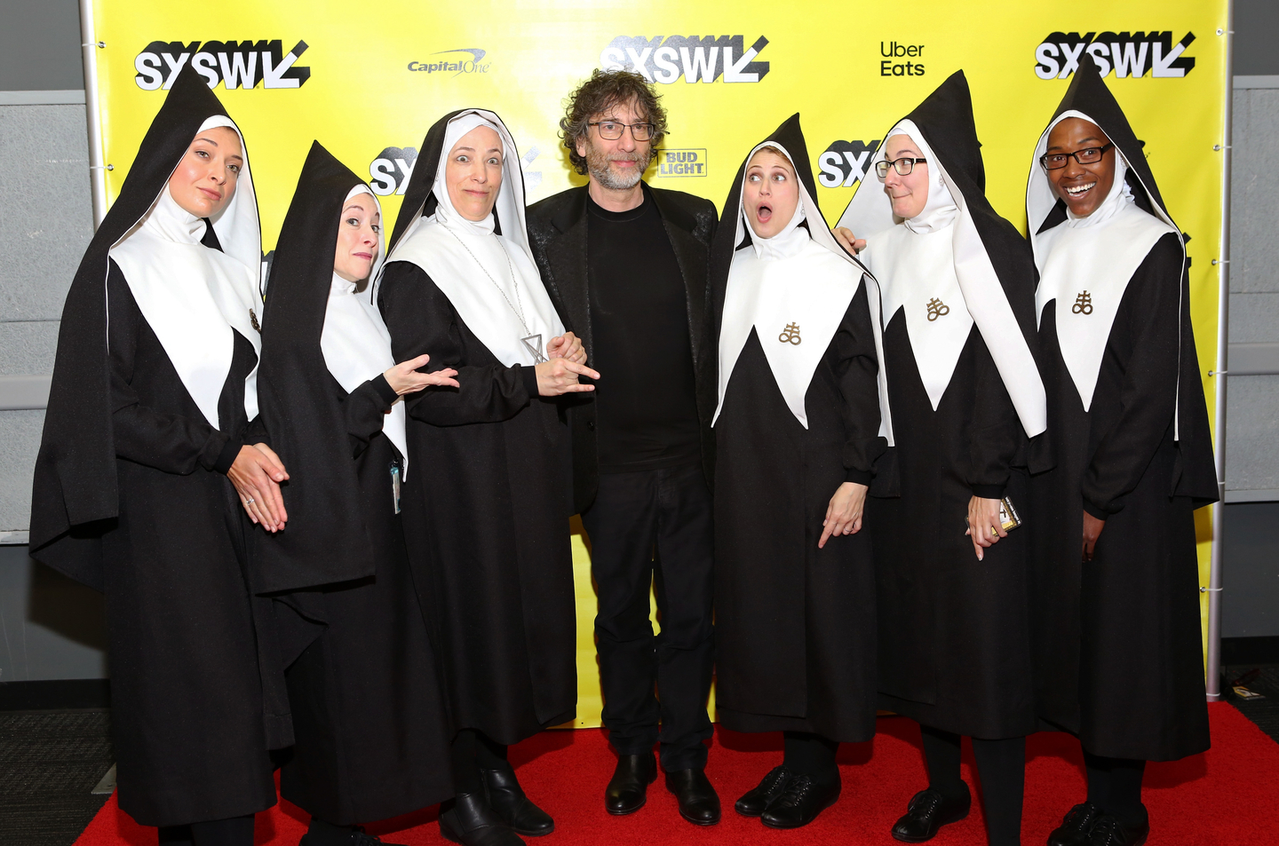 Neil Gaiman (C) with Good Omens' Chattering Order of St. Beryl.