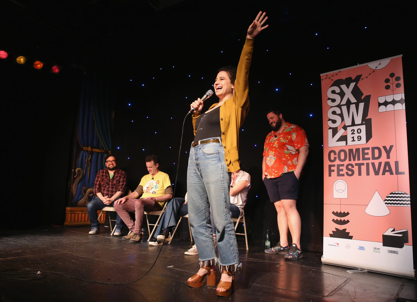 (L-R) Horatio Sanz, Matt Besser, Ilana Glazer, and Jon Gabrus speak onstage at Upright Citizens Brigade's ASSSSCAT at Esther's Follies.