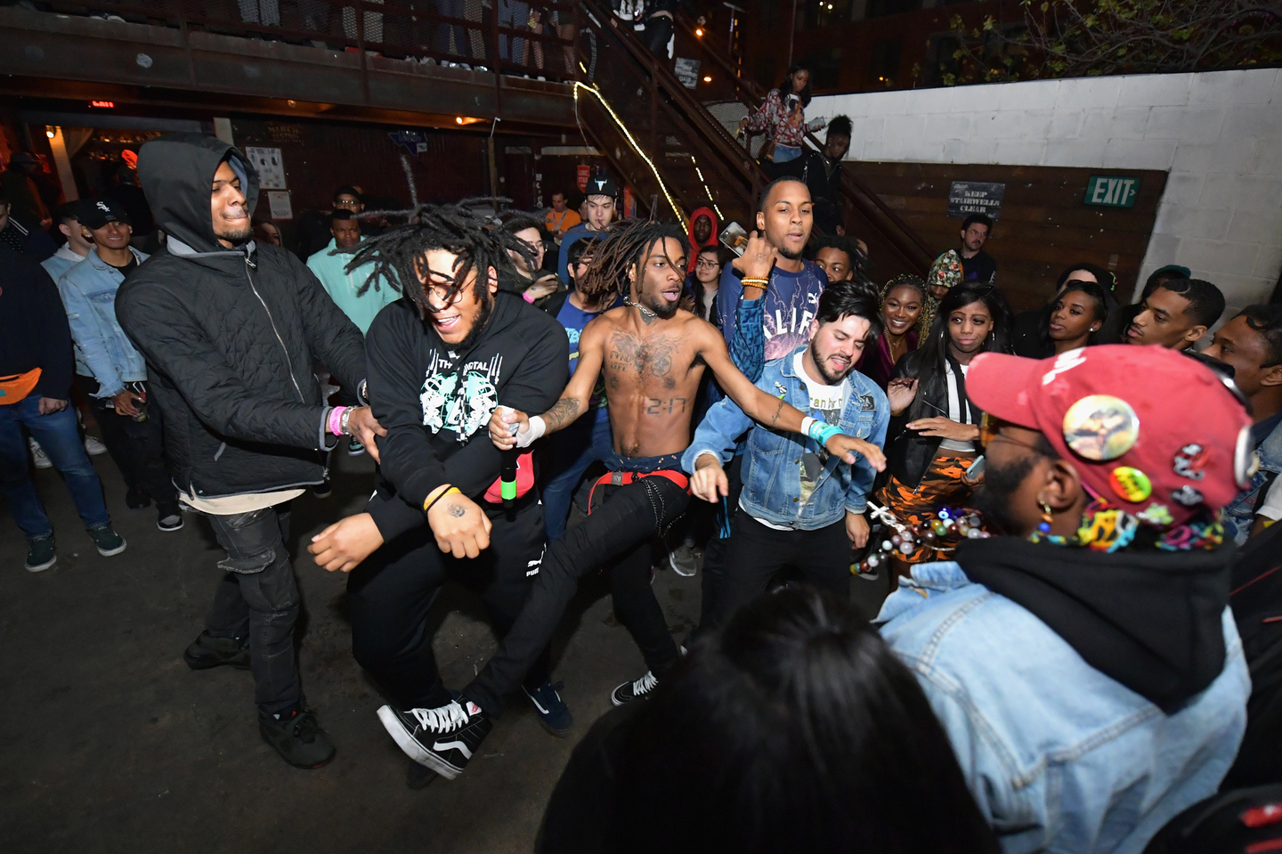 J.K. The Reaper (C) performs in the crowd at the Rolling Loud showcase at Mohawk.