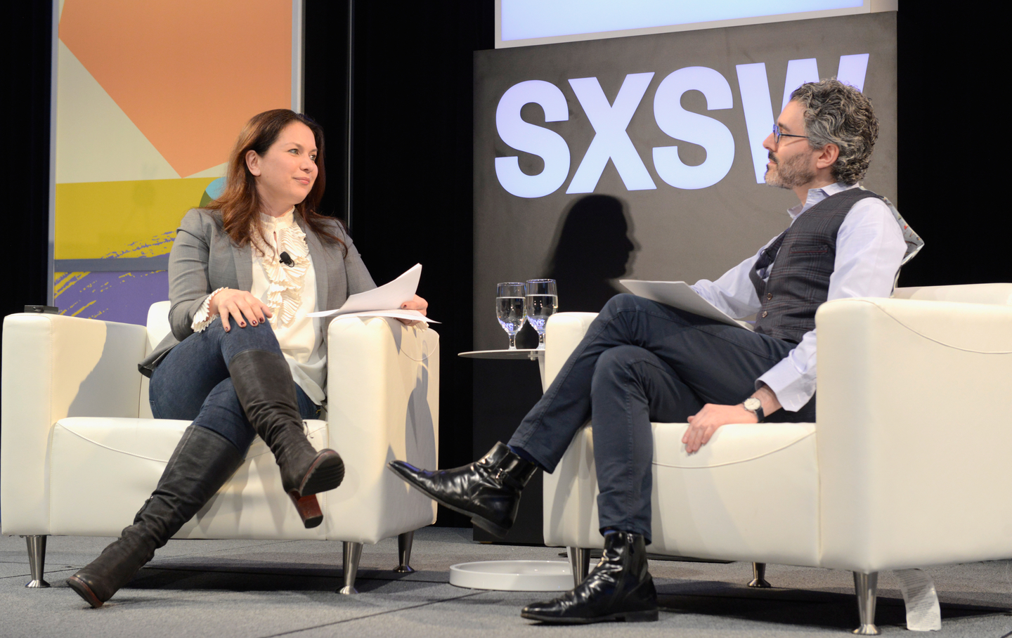 Rukmini Callimachi and Michael Barbaro speak onstage at 