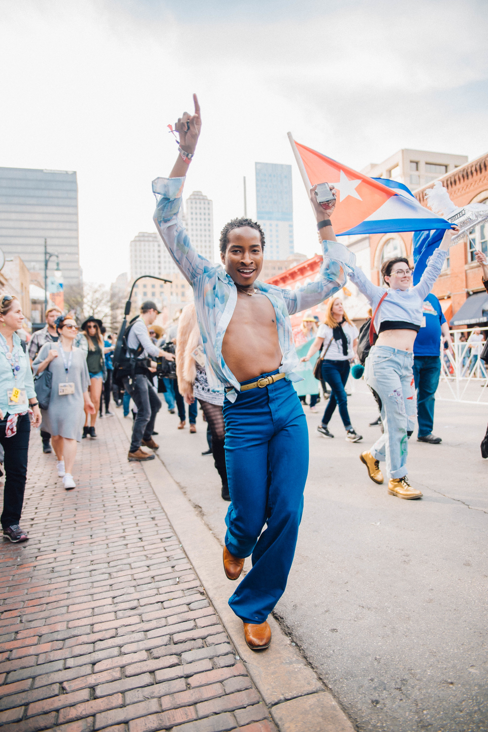 After the afternoon screening of A Tuba to Cuba, the Preservation Hall Jazz Band led a second line parade from the Paramount Theatre to the Mohawk.