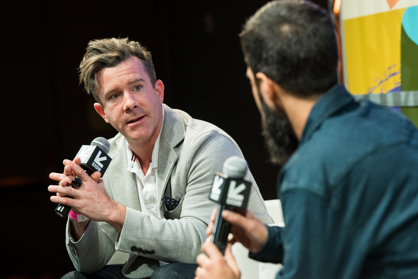 Benjamin Groff talks with Featured Speaker Savan Kotecha. Photo by Danny Matson