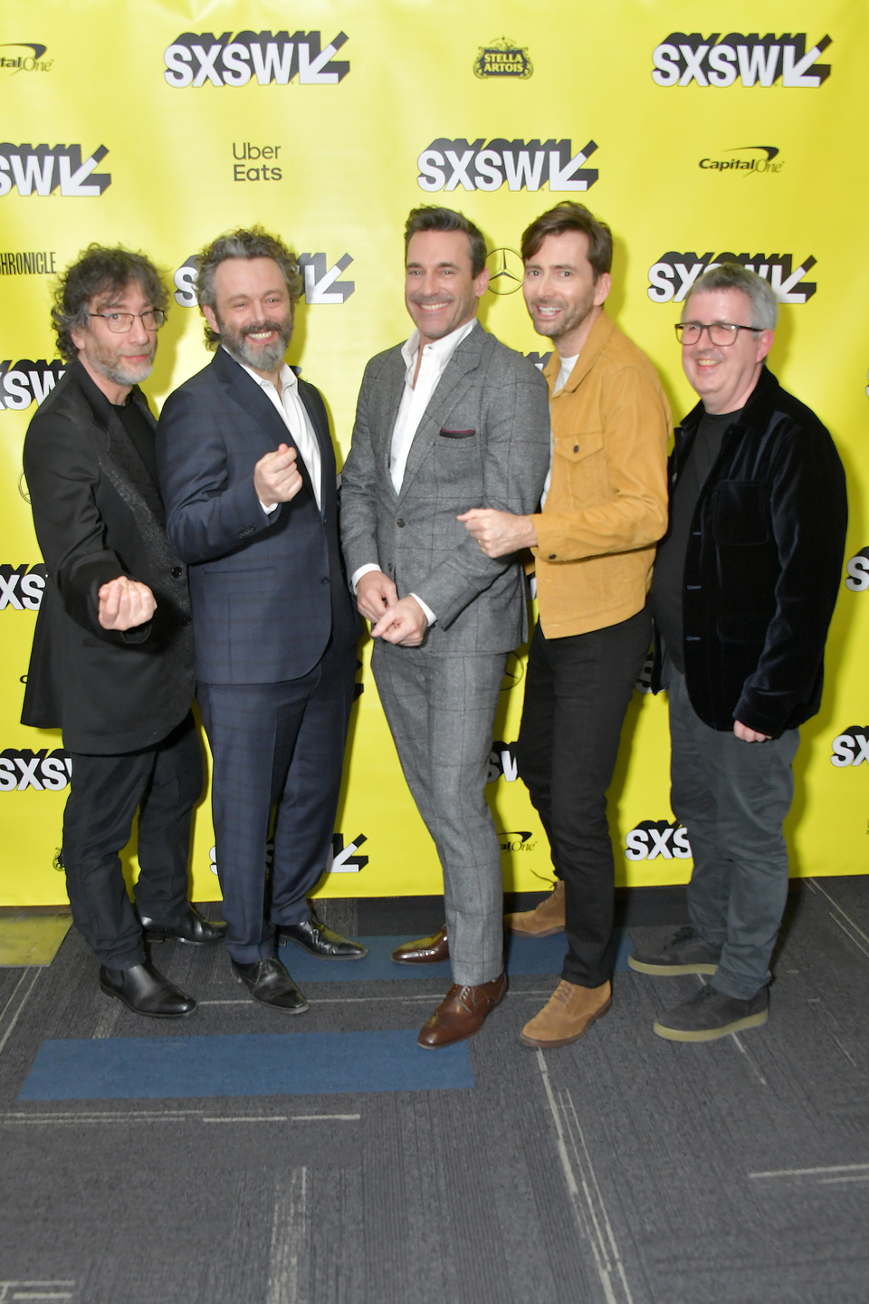(L-R) Neil Gaiman, Michael Sheen, Jon Hamm, David Tennant, and Douglas Mackinnon at Good Omens: The Nice and Accurate SXSW Event – Photo by Michael Loccisano/Getty Images for SXSW