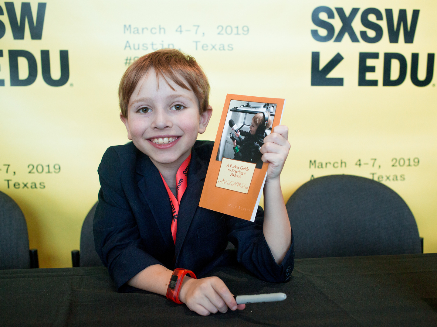 A Pocket Guide to Starting a Podcast Book Signing – Photo by Akash Kataria