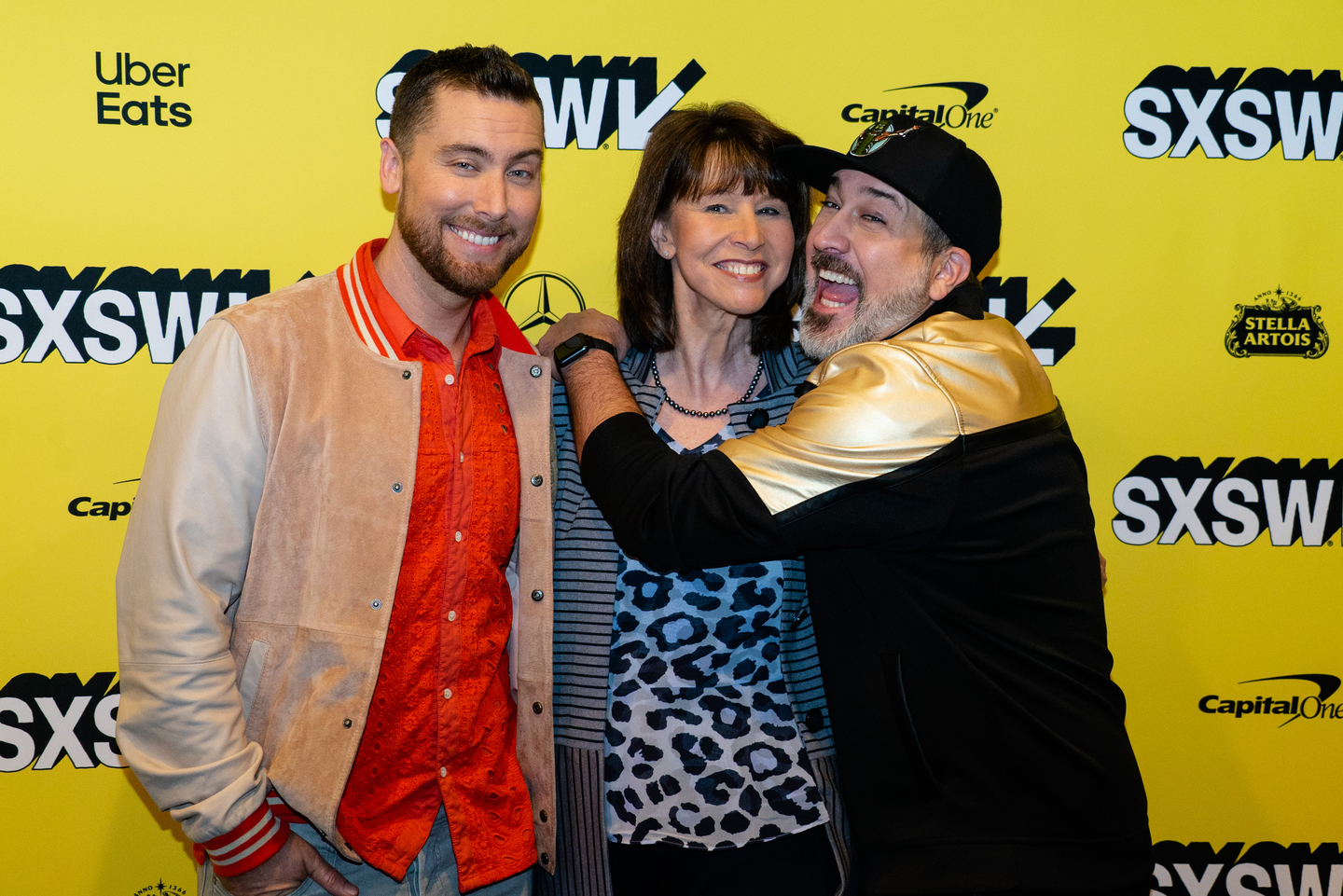 Lance Bass, Diane Bass, and Joey Fatone at The Boy Band Con: The Lou Pearlman Story World Premiere – Photo by Kit McNeil