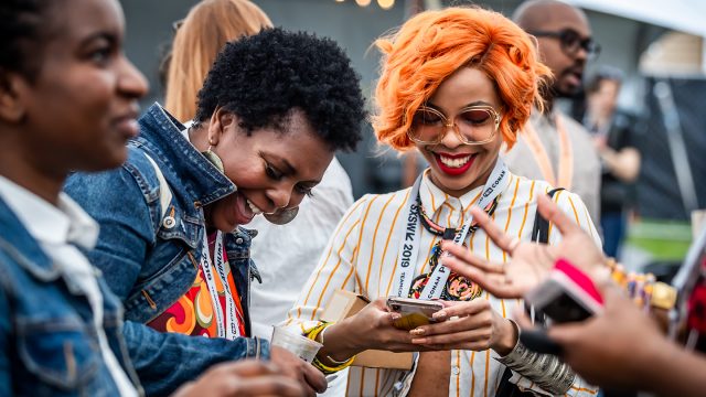 Attendees networking at the Black Tech Meet Up during SXSW 2019. Photo by Aaron Rogosin.