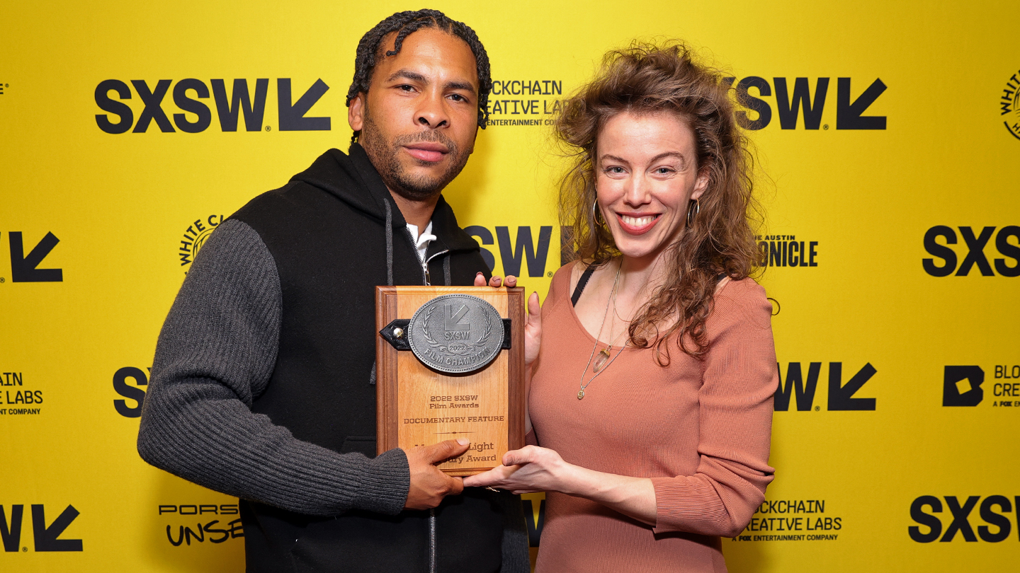 George Anthony Morton and Rosa Ruth Boesten pose with Documentary Feature Competition Award for ‘Master of Light’ – SXSW 2022 – Photo by Rich Fury/Getty Images for SXSW