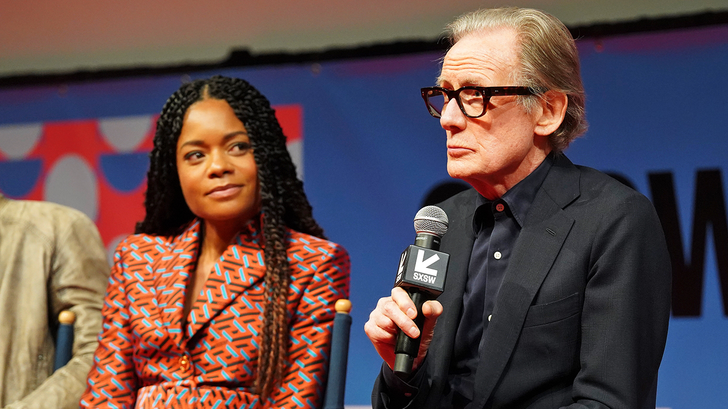 Naomie Harris and Bill Nighy speak onstage during "The Man Who Fell To Earth" premiere – SXSW 2022 – Photo by Amy E. Price/Getty Images for SXSW
