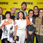 L-R) Jenny Slate, Daniel Kwan, Tallie Mendel, Jamie Lee Curtis, Daniel Scheinert, Stephanie Hsu, Ke Huy Quan, Jonathan Wang, Michelle Yeoh and Harry Shum Jr. attend "Everything Everywhere All At Once" premiere – SXSW 2022 – Photo by Rich Fury/Getty Images for SXSW