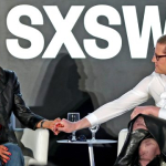 (L-R) Secretary of the Interior Deb Haaland and Charlotte Clymer speak onstage at 'Auntie Deb's Guide to Equity & Inclusion' – SXSW 2022 – Photo by Tim Strauss