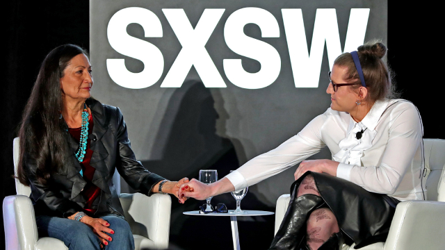 (L-R) Secretary of the Interior Deb Haaland and Charlotte Clymer speak onstage at 'Auntie Deb's Guide to Equity & Inclusion' – SXSW 2022 – Photo by Tim Strauss